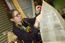 Volunteer KImberly tending lanterns.jpg